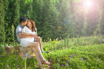 Asian couple together on nature summer