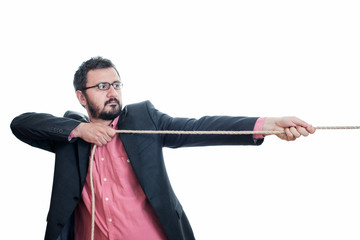 Man pulling a rope tug