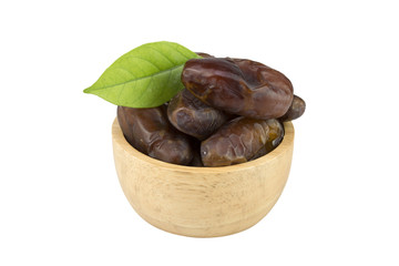 dried dates in the bowl on white background