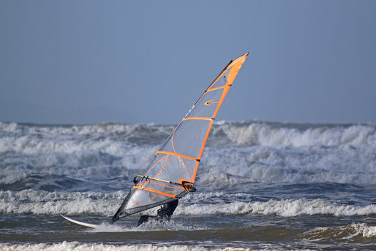 Windsurfer in waves