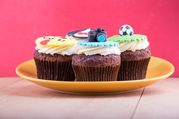 Delicious cupcakes on table