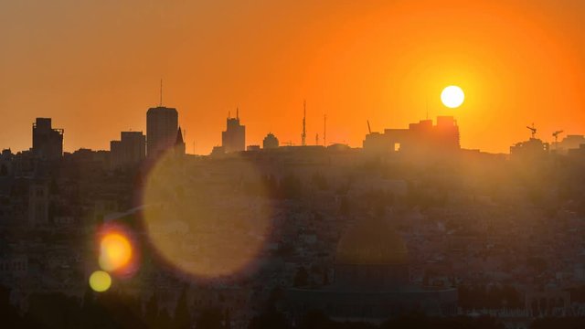 Jerusalem view over the City at sunset timelapse with the Dome of the Rock from the Mount of Olives.