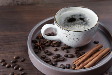 Cup of coffee and coffee beans