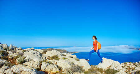 woman running on the rock