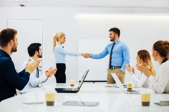 Business people shaking hands after a successful agreement