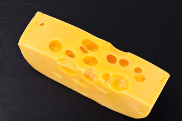 Swiss Cheese on Black Background