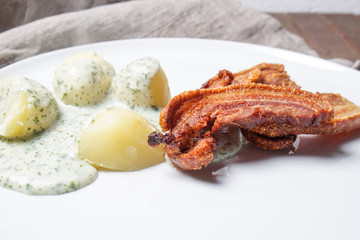 Denmark's national dish fried pork belly with parsley sauce