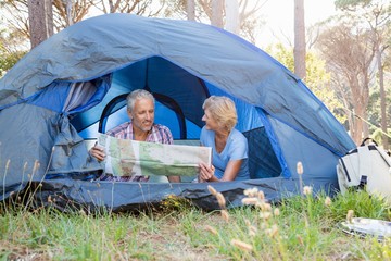 Mature couple studying map