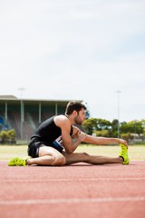 Athlete doing stretching exercise