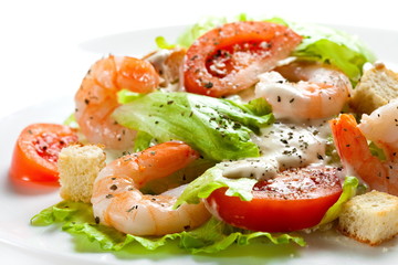 Caesar salad close up on white background 