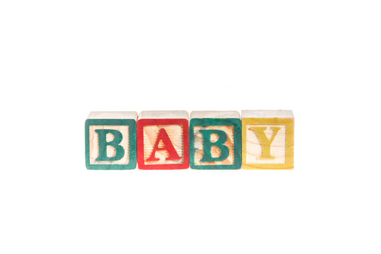 photo of a alphabet blocks spelling BABY isolate on white backgr