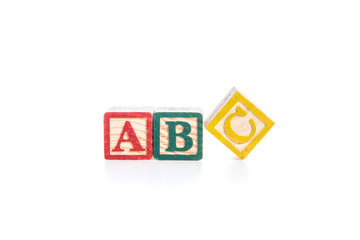 photo of a alphabet blocks spelling ABC isolate on white backgro