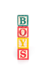 photo of a alphabet blocks spelling BOYS isolate on white backgr