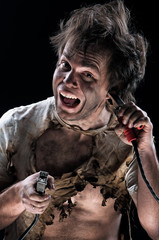 Portrait of burnt man over black background