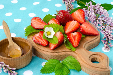 Ripe strawberry and honey. The summer season.