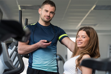 Personal Trainer Measure Time On Stopwatch