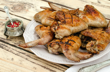 Chicken wings grilled on the plate