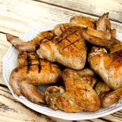 Chicken wings grilled on the plate