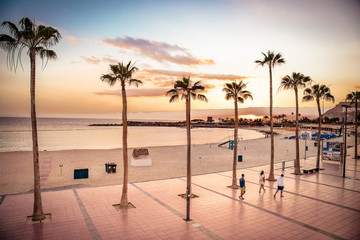 Sunset at Playa de Amadores in Puerto Rico town, Gran Canaria. S