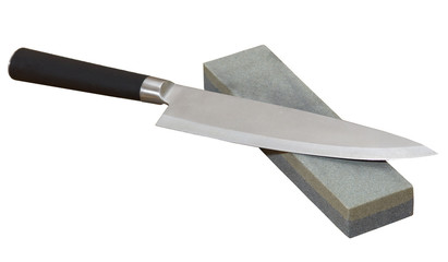 Knife and whetstone isolated on white background