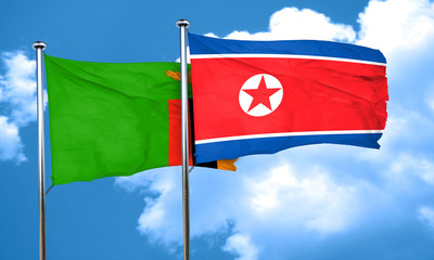Zambia flag with North Korea flag, 3D rendering
