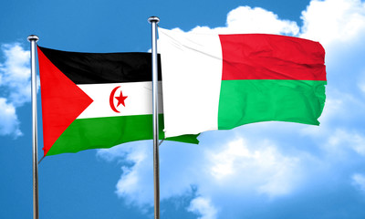 Western sahara flag with Madagascar flag, 3D rendering