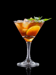 Fresh cold alcohol drink over black background