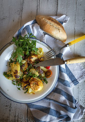 Fried potato with onion and parsley