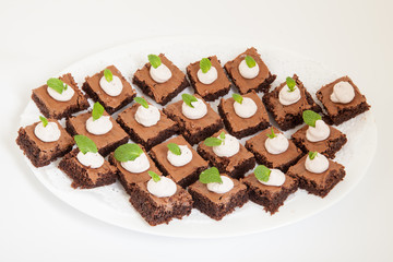 party platter with small chocolate cakes