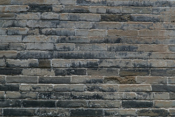 Old brick wall in gray color for background and texture