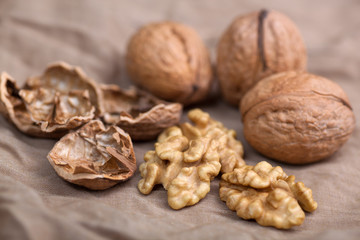 Walnut without shell close-up, and nuts in the shell