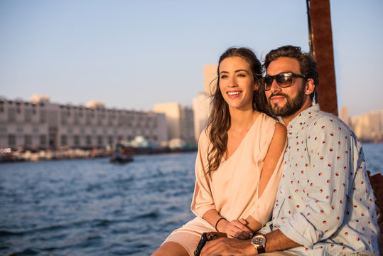 Romantic couple on boat at Dubai marina, United Arab Emirates