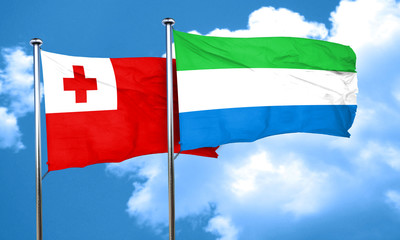 Tonga flag with Sierra Leone flag, 3D rendering