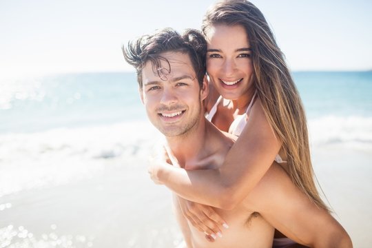 Front view of cute couple embracing