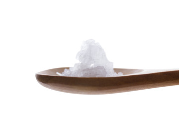 salt crystal / salt crystal in wood spoon isolated