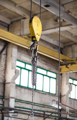 Inside the factory overhead crane hook Closeup