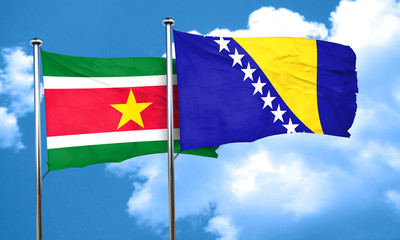 Suriname flag with Bosnia and Herzegovina flag, 3D rendering