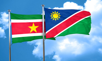 Suriname flag with Namibia flag, 3D rendering