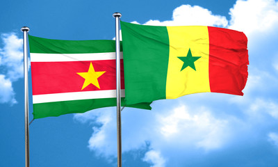 Suriname flag with Senegal flag, 3D rendering