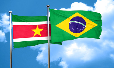 Suriname flag with Brazil flag, 3D rendering