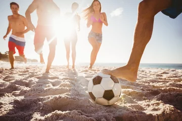 Foto op Canvas Friends playing football © WavebreakmediaMicro