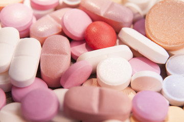Macro photograph of various colorful medicinal pills