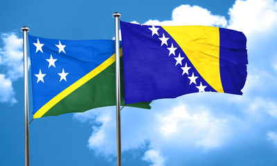 Solomon islands flag with Bosnia and Herzegovina flag, 3D render