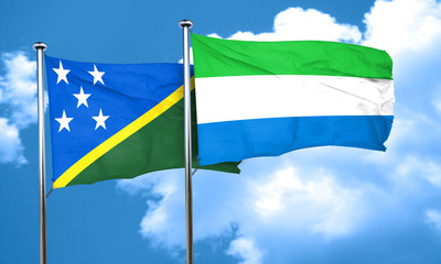 Solomon islands flag with Sierra Leone flag, 3D rendering