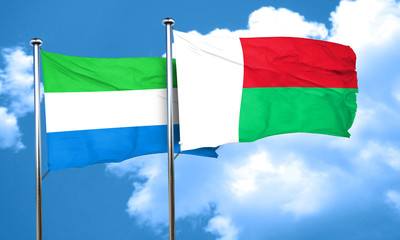 Sierra Leone flag with Madagascar flag, 3D rendering