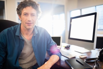 Businessman sitting on a swivel chair