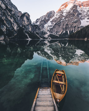 Sunrise paddle - Boat inviting for a ride on incredible lake during sunrise.