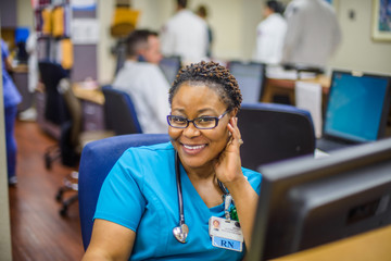 Hospital staff at reception desk in hospital