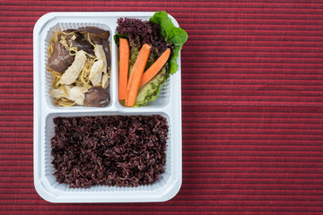 Food series : Stir fry chicken breast with ginger, served with brown rice and fresh vegetable, Thai foods