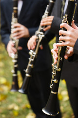 group of musicians playing the clarinet.